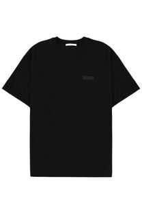 Givenchy men’s black short-sleeved t-shirt with minimalist design and subtle rectangular patch on the chest