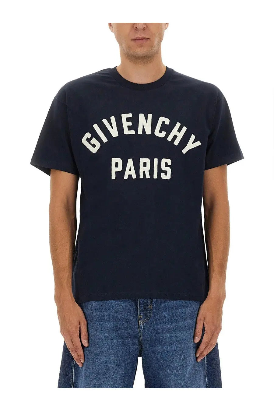 Navy blue Givenchy men’s shirt with white arched lettering across the chest for casual wear