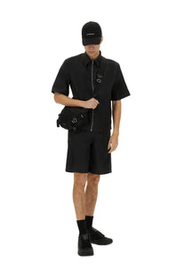 Black Givenchy men’s short track casual crossbody bag with silver hardware and minimalist leather design