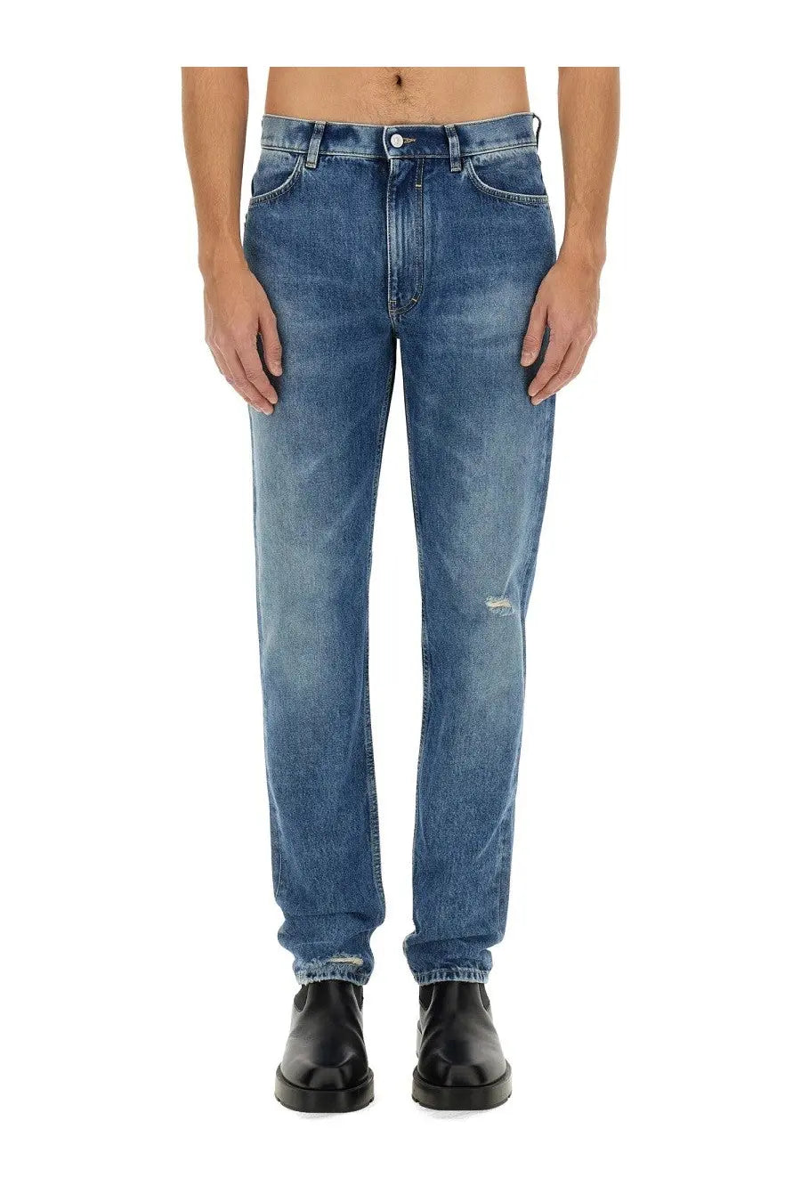 Givenchy men’s slim fit denim jeans in blue with faded wash and subtle distressing at the knees
