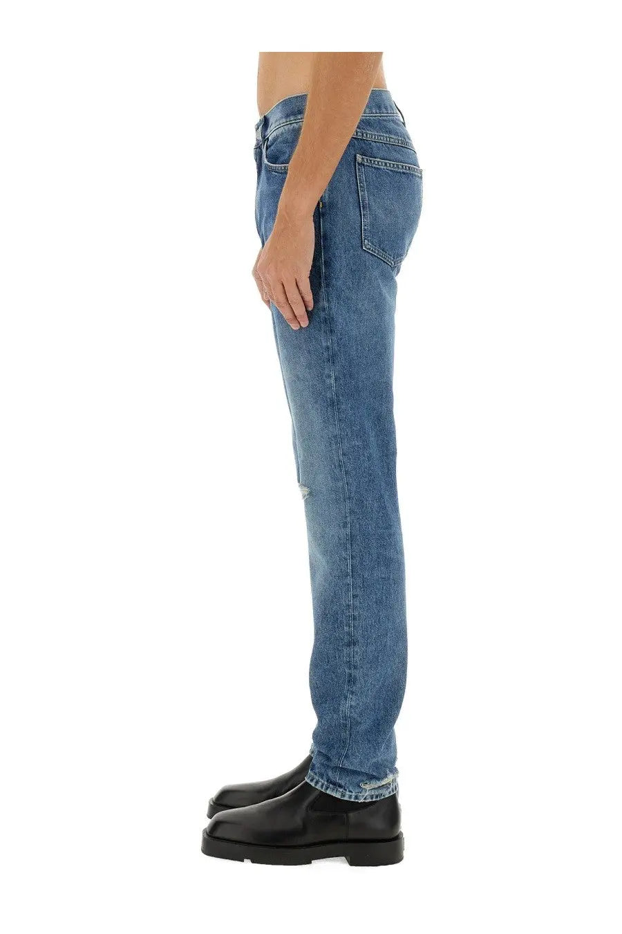 Givenchy men’s slim fit blue denim jeans with straight leg cut and subtle distressing at the knee