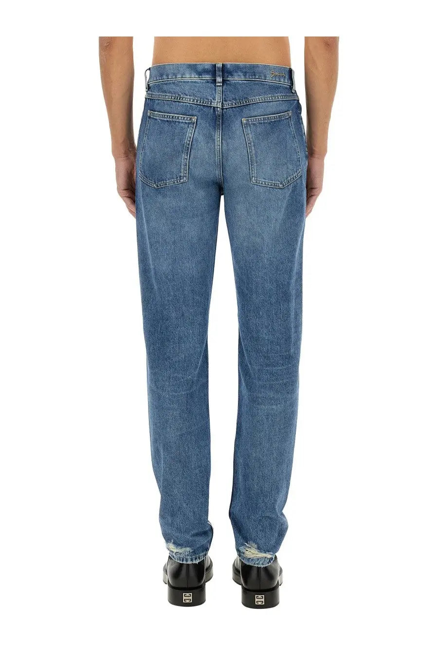 Givenchy men’s slim fit denim jeans in blue with straight-leg cut and distressed cuffs made of denim material