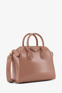 A taupe Givenchy Antigona satchel with structured leather body and gold-tone hardware for women’s use