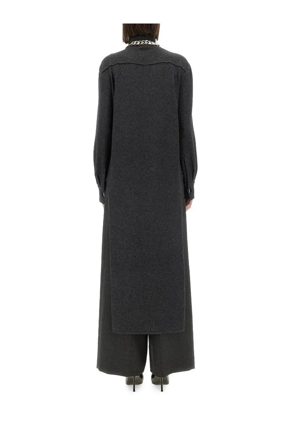 Givenchy women’s grey cashmere pullover with a long dark gray textured coat and chain necklace at the collar