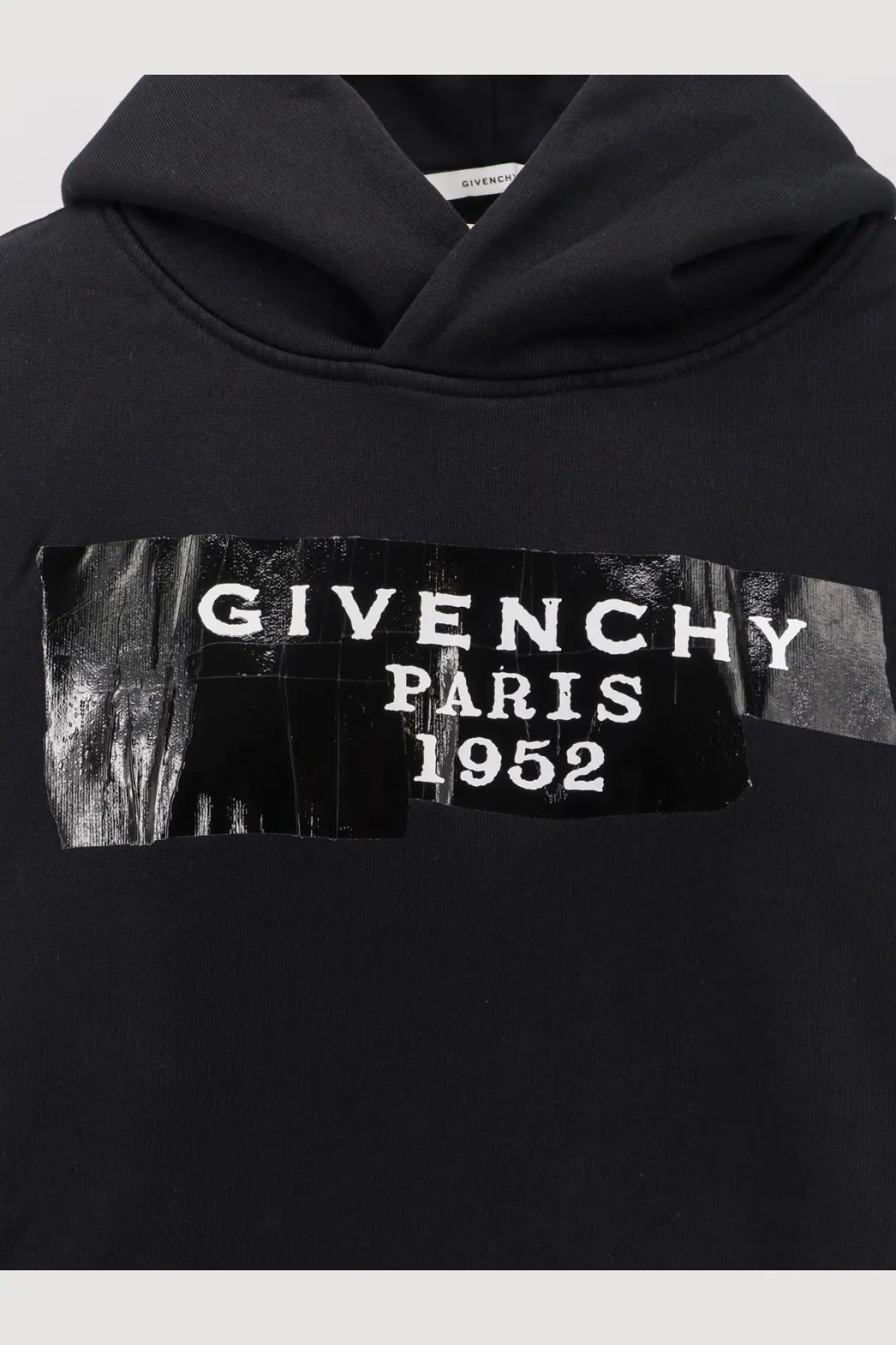Givenchy women’s black cotton hooded sweatshirt featuring a bold white givenchy paris 1952 logo on the chest