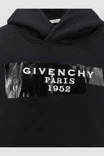 Givenchy women’s black cotton hooded sweatshirt featuring a bold white givenchy paris 1952 logo on the chest