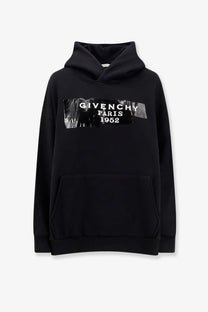 Givenchy women’s black cotton hooded sweatshirt with bold graphic print across the chest from paris 1952 collection