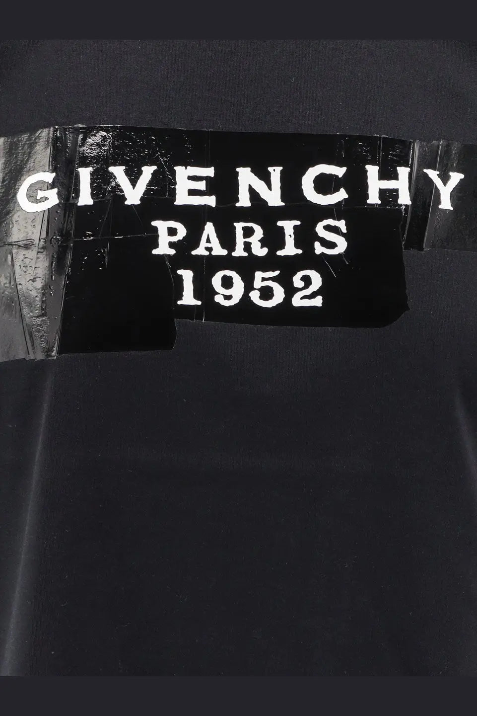 Givenchy paris 1952 label with white lettering on black cotton fabric of givenchy women’s cotton shirt black