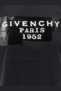 Givenchy paris 1952 label with white lettering on black cotton fabric of givenchy women’s cotton shirt black
