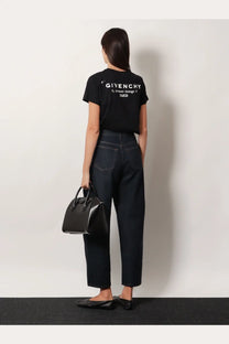 Black givenchy tote bag with structured design and top handles complementing givenchy women’s cotton shirt black