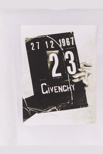 Black givenchy cotton shirt with a vintage calendar plaque featuring white numerals and distressed texture