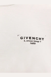 White Givenchy women’s cotton t-shirt featuring black printed text with brand name and address on the front