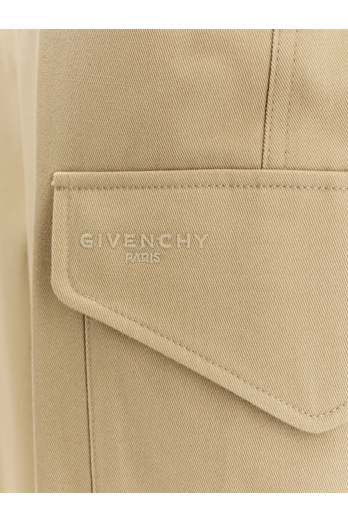 Beige givenchy paris canvas pocket with subtle embossed branding on women’s cotton and wool cargo trousers