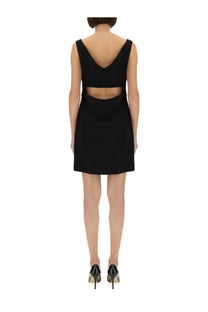 Givenchy women’s black crepe and satin sleeveless mini dress with deep v-back and side cutouts shown from back side