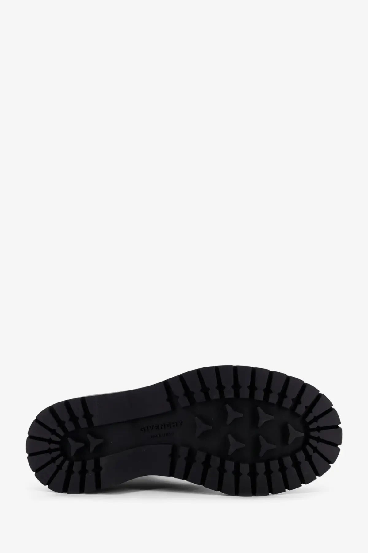 Black rubber sole with deep textured tread and embossed brand logo on givenchy women’s leather ankle boots black