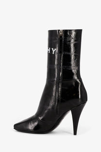 Givenchy women’s black patent leather ankle boot with high stiletto heel and white Givenchy logo on the side