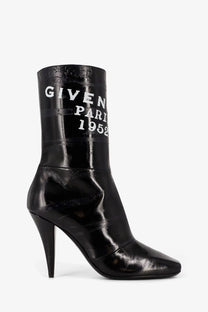Givenchy women’s black leather ankle boot with high stiletto heel and white givenchy paris 1952 lettering on shaft