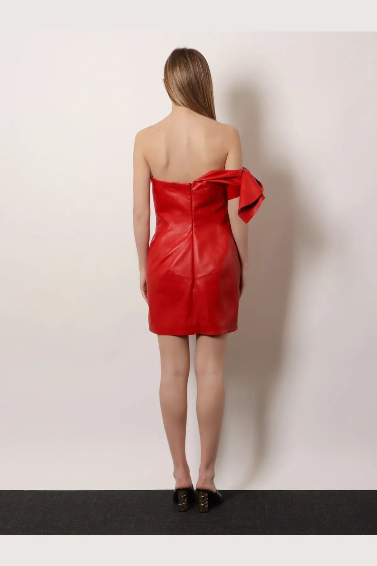 Givenchy women’s red leather strapless mini bustier dress with a dramatic bow detail on the shoulder