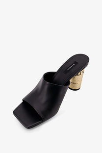 Givenchy women’s black leather mule sandal with gold cork heel and branded insole