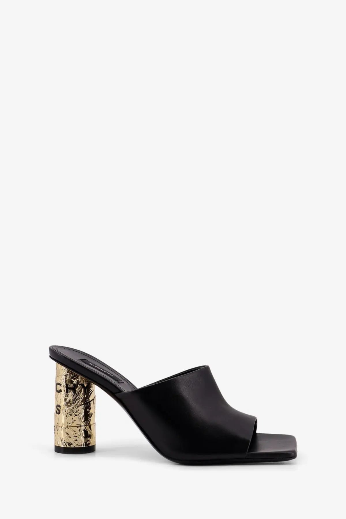 Givenchy women’s black leather mule sandal with a gold foil block heel featuring embossed lettering