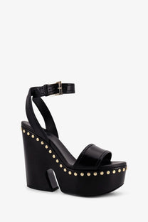 Givenchy women’s black leather platform sandal with chunky heel and gold-tone studded toe strap
