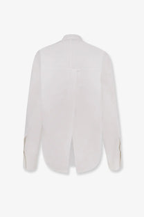 Givenchy women’s white cotton blouse with a subtle back split and delicate gold trim on long sleeves cuffs shown from back