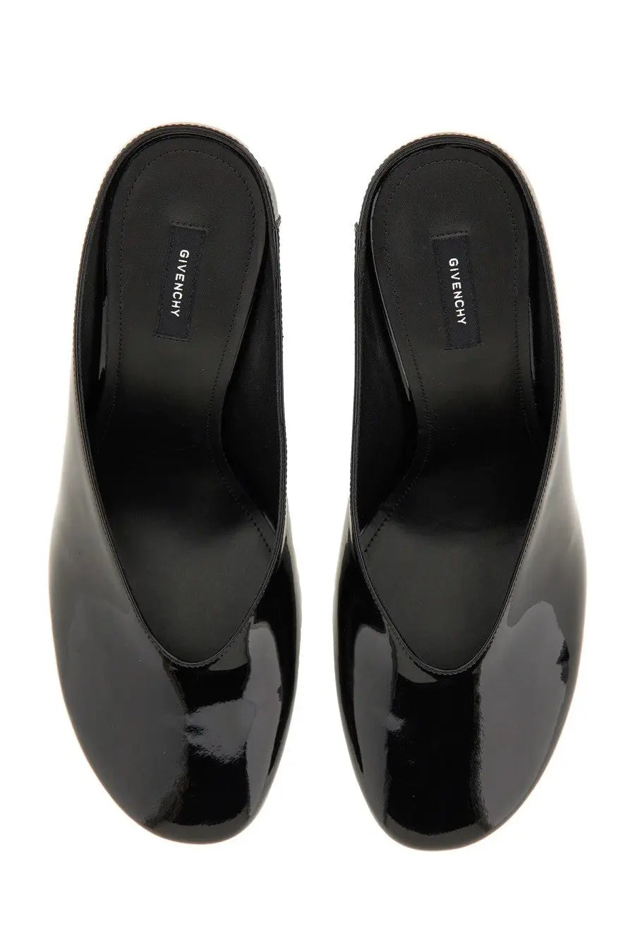 Givenchy women’s sculpted leather pumps black featuring black patent leather mules with a sleek glossy finish and minimalist design