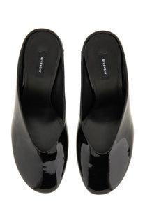 Givenchy women’s sculpted leather pumps black featuring black patent leather mules with a sleek glossy finish and minimalist design