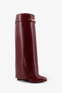 Burgundy leather Givenchy women’s shark boots with gold-tone logo band in red for stylish wear