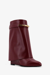 Givenchy women’s shark leather boots in sleek burgundy with gold-tone buckle detail ankle design