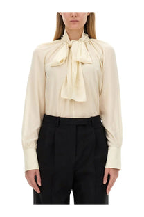 Givenchy women’s cream-colored silk blouse with gathered neckline and prominent bow at the front