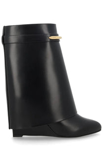 Black leather givenchy women’s stivale shark pinch boot with gold-tone logo plaque in black