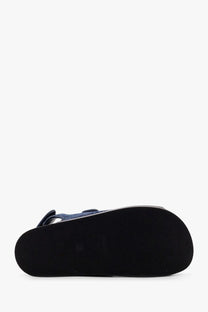 Givenchy women’s strap flat denim sandals in blue with black rubber sole and denim material