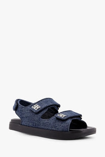 Givenchy women’s strap flat denim sandals in blue with black rubber sole and white logo patches