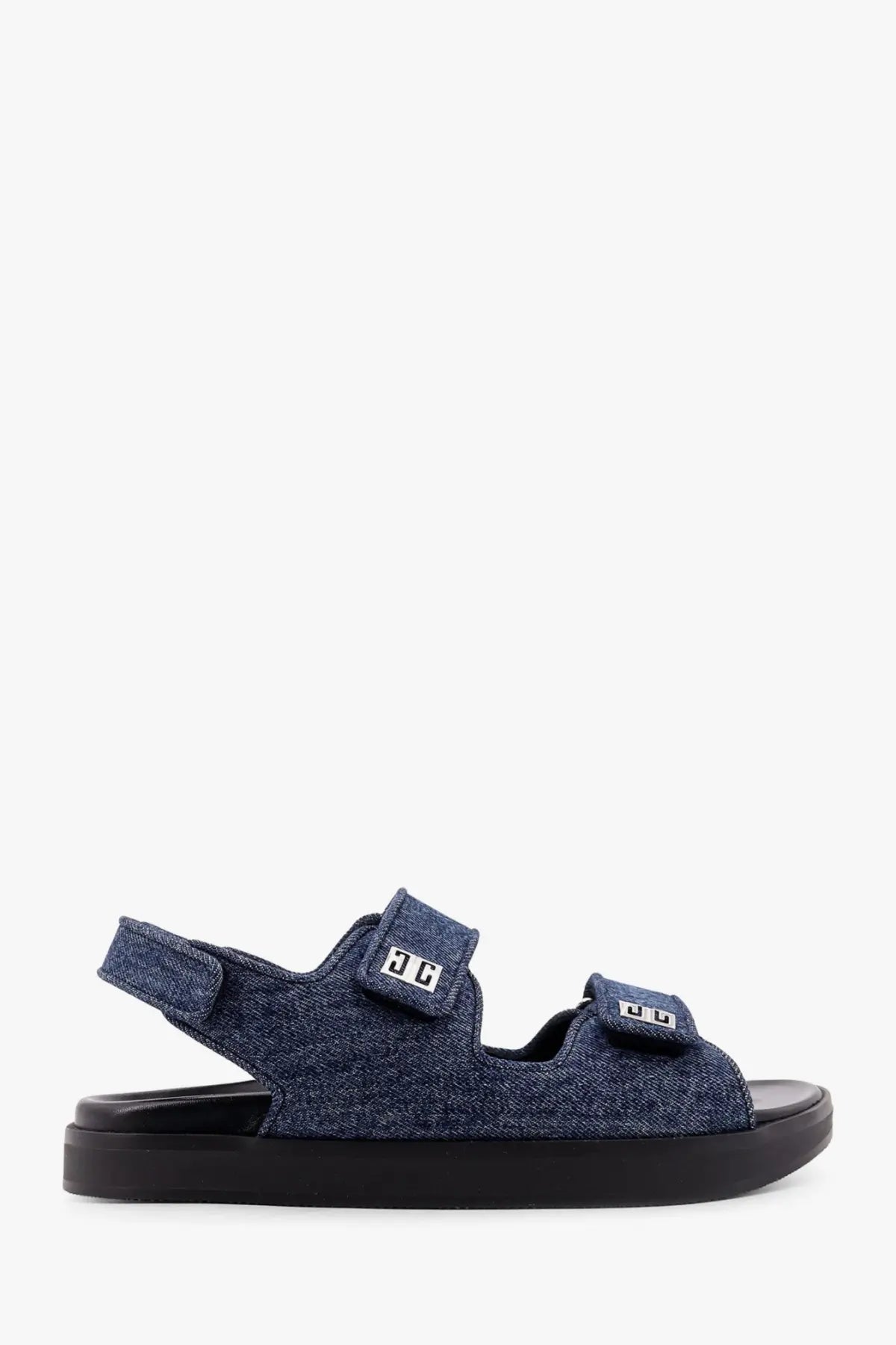 Givenchy women’s strap flat denim sandals in blue with black rubber sole and white logo patches