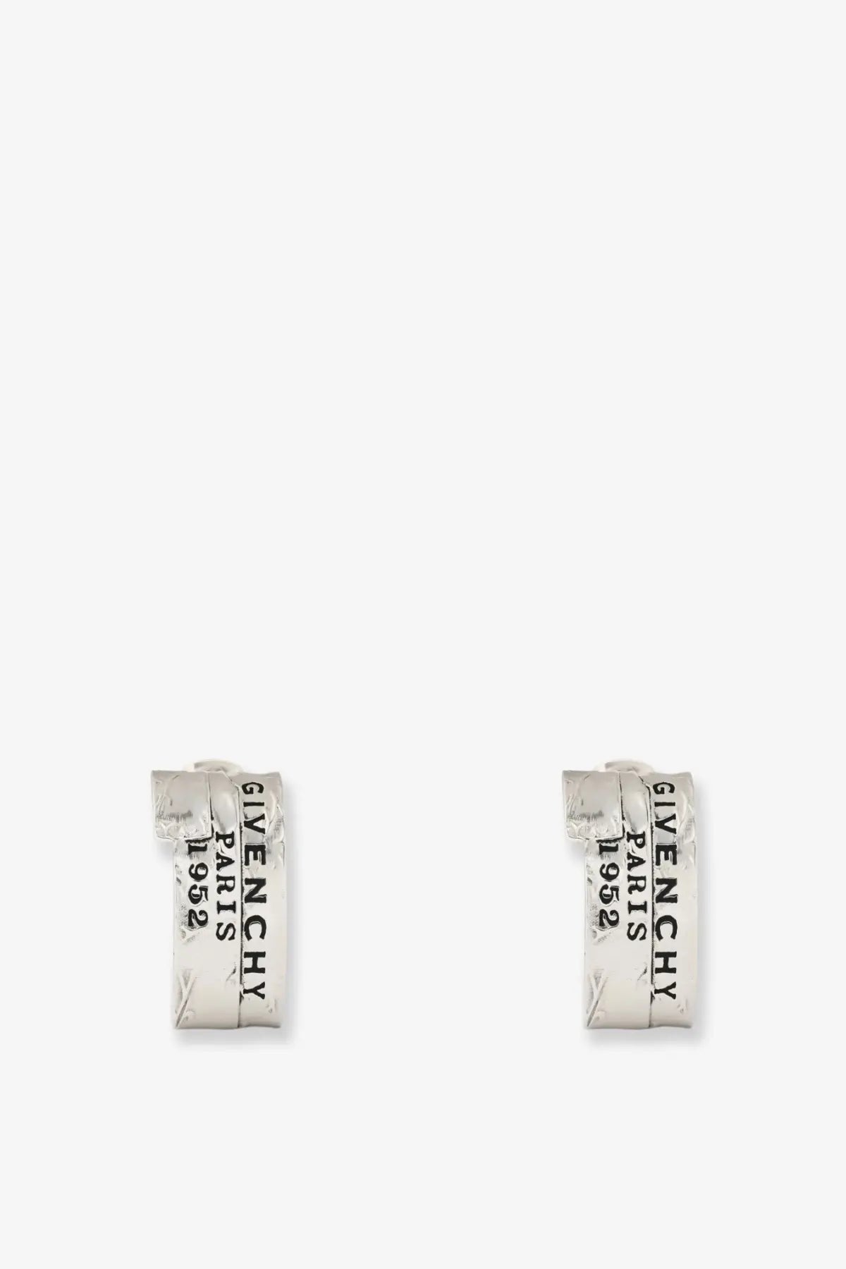 Silver Givenchy Paris 1952 huggie earrings with a textured slightly distressed finish in metal and enamel silver