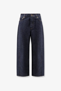 Givenchy women’s twisted dark blue denim jeans featuring dark indigo high waist and wide-leg cut