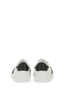 Givenchy women’s urban street sneaker white leather with black rubber heel tabs and side stripes shown from the back