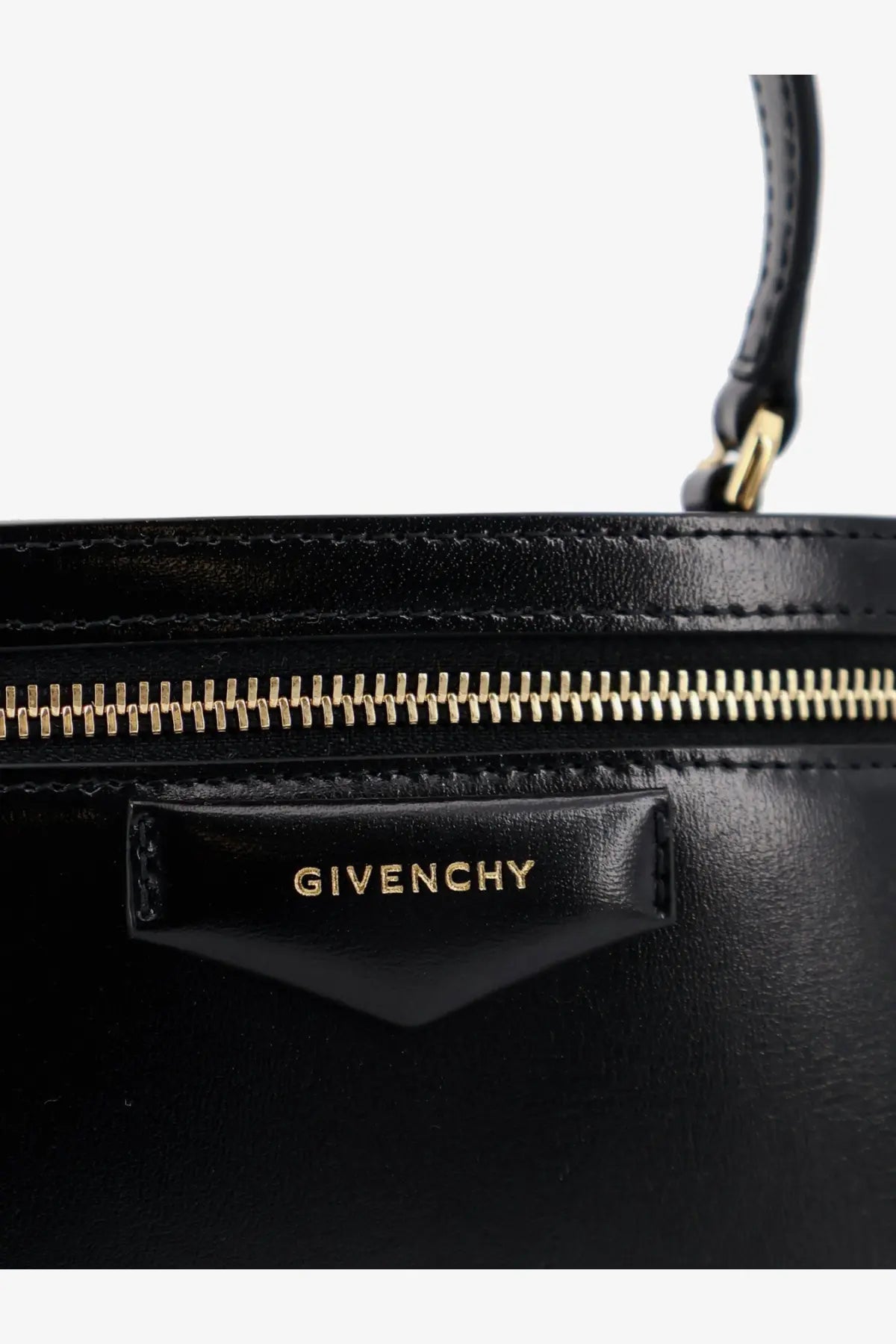 Givenchy women’s vanity antigona black leather handbag with gold-tone zipper and logo plaque