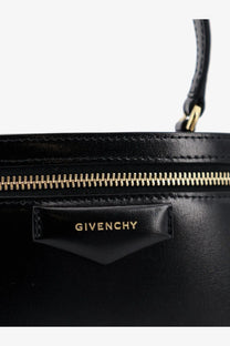 Givenchy women’s vanity antigona black leather handbag with gold-tone zipper and logo plaque