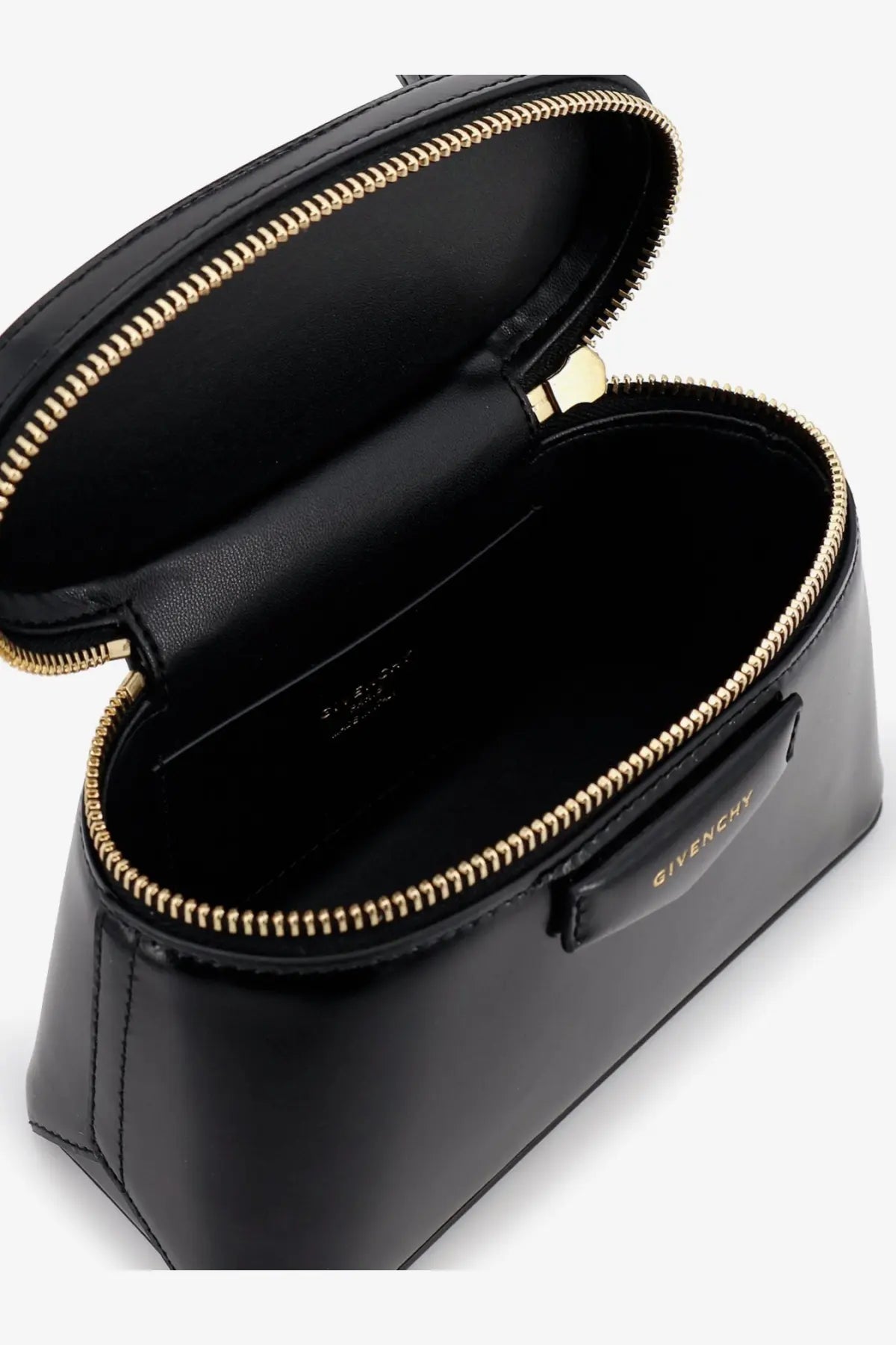 Black givenchy women’s vanity antigona leather handbag with gold-tone zipper and hardware makeup case detail