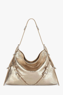 Givenchy women’s voyou metallized leather shoulder bag in metallic gold with a sleek structured design and adjustable strap