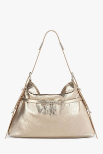 Givenchy women’s voyou metallized leather shoulder bag gold with metallic gold leather and dual adjustable shoulder straps