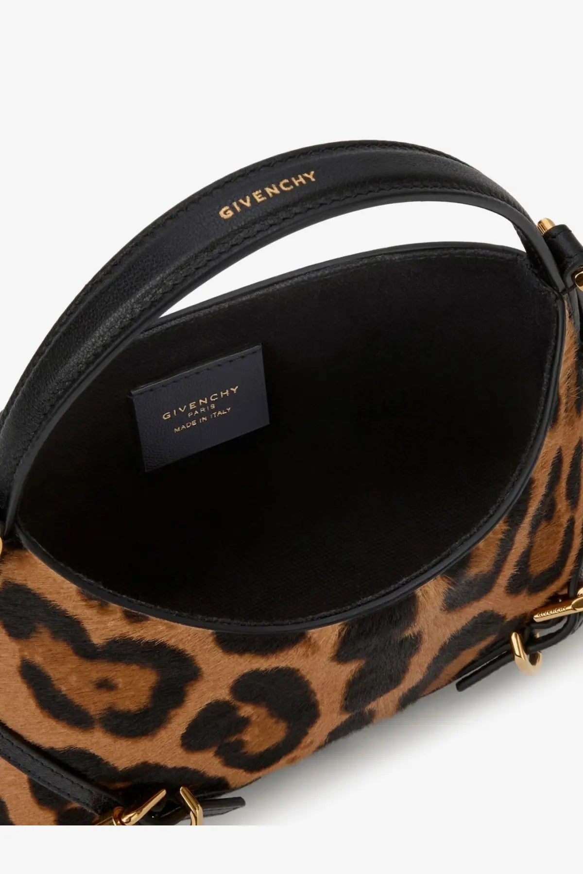 Black leather handle with gold-tone givenchy branding on a leopard-print pony skin crossbody bag