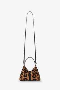 Givenchy women’s Voyou nano crossbody bag in black pony skin with a sleek triangular shape and bold leopard print straps