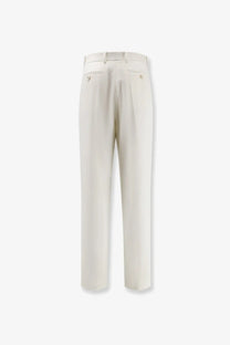 Cream-colored tailored givenchy women’s wool and mohair trousers with straight-leg cut and subtle back pleats shown from back