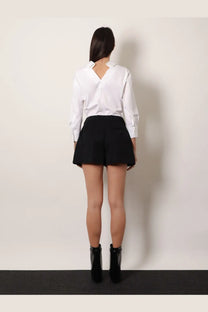 Givenchy women’s wool shorts in black with a tailored fit high waist and subtle side pockets