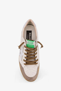 Cream-colored leather golden goose men’s ball star sneaker with brown laces and distressed rubber sole