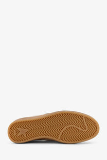 Tan rubber sole with wavy tread pattern and embossed logo on golden goose men’s ball star leather sneakers white