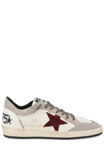 Golden goose men’s ballstar sneaker in white and gray suede with bold red star patch black laces and vintage finish